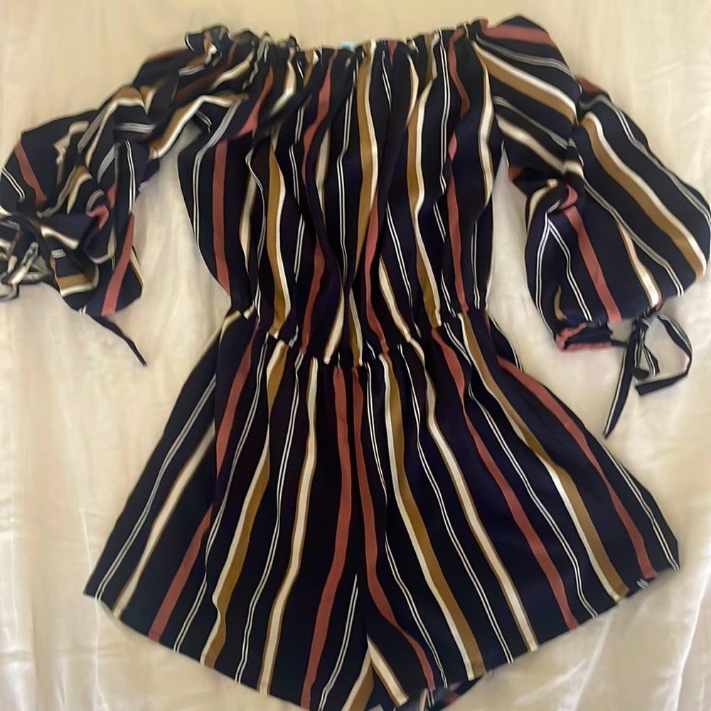 Women Romper size small. She and Sky. Local boutique.worn once for 2 hours.